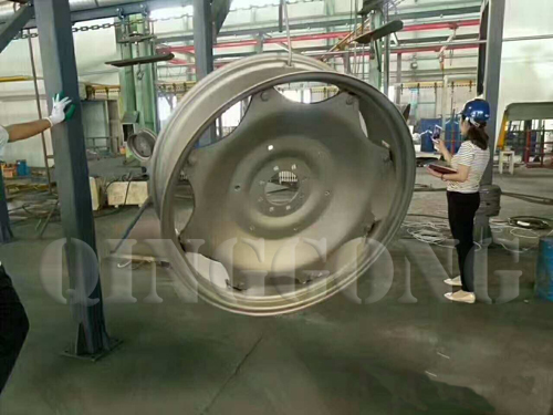 Hanger type shot blasting machine for cleaning alloy rims