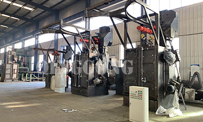 Hanger type shot blasting machine in production